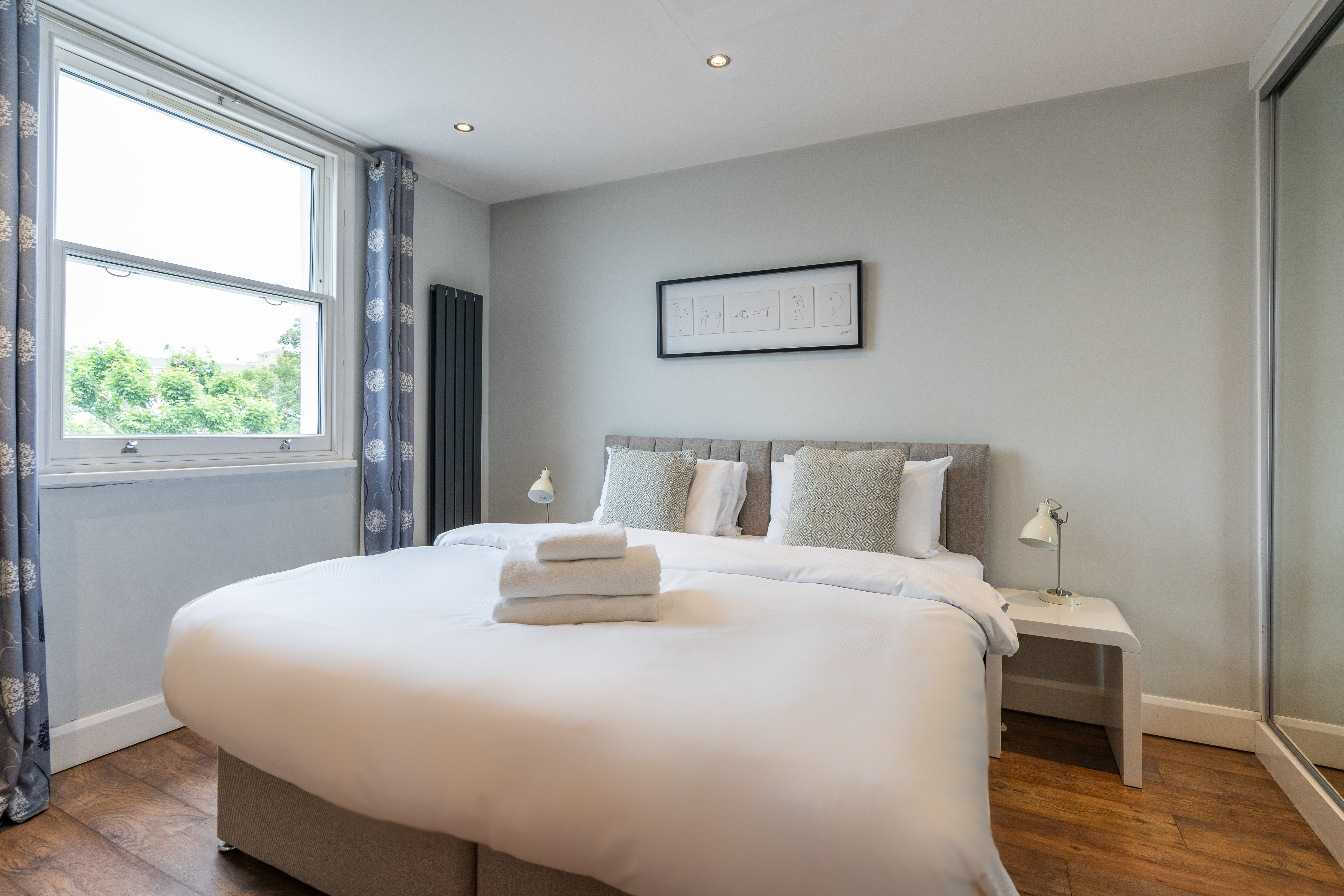Sunny bed at Lamington Apartments, Hammersmith, London - Citybase Apartments